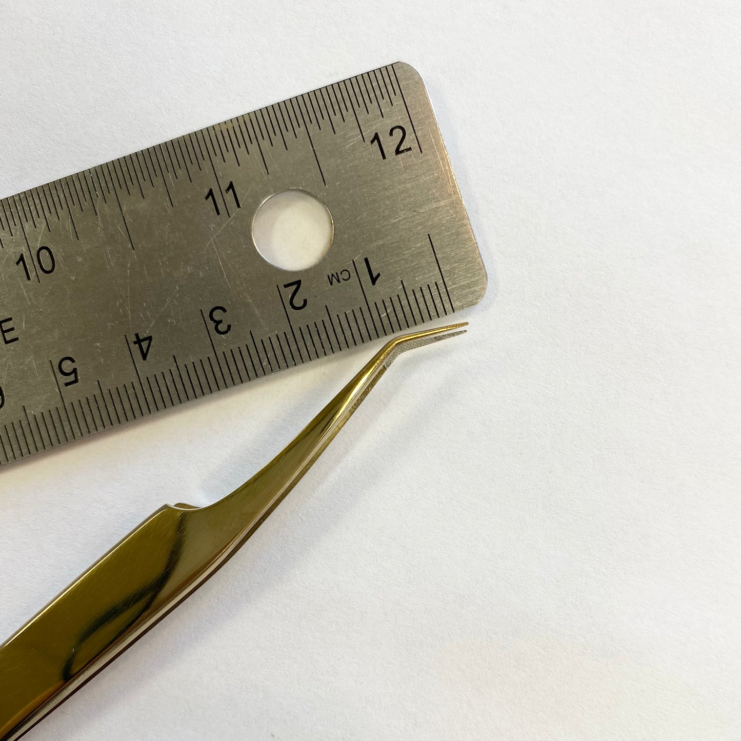 Gold angled fiber tip tweezer