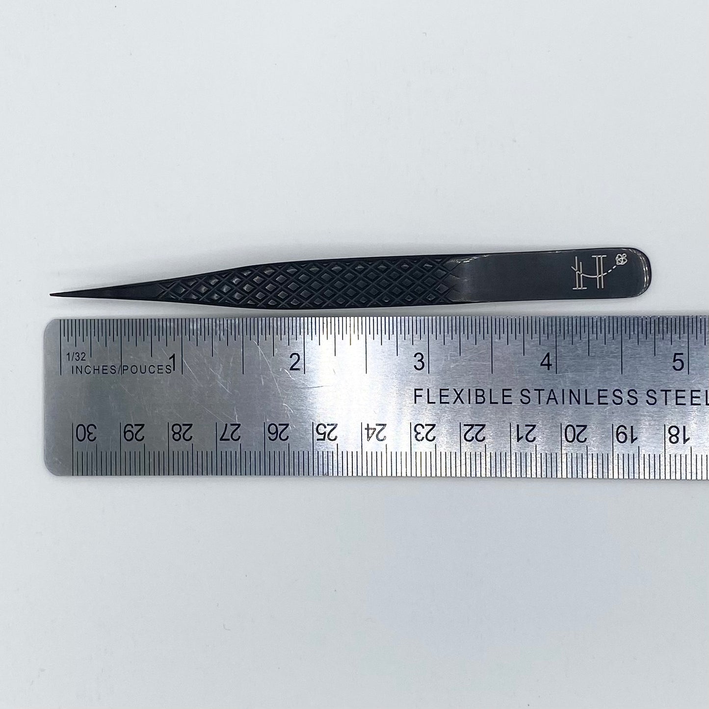 Straight black tweezer