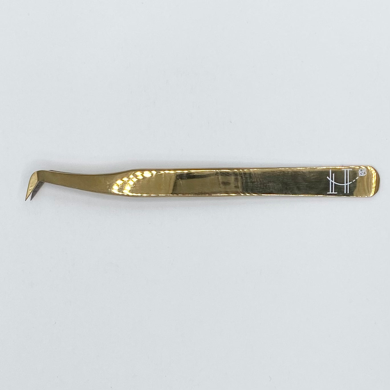 Gold booted tweezer- fiber tip