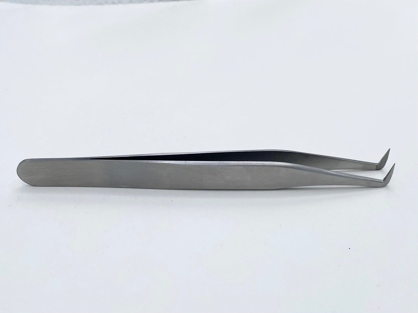 L shape fiber tip tweezer